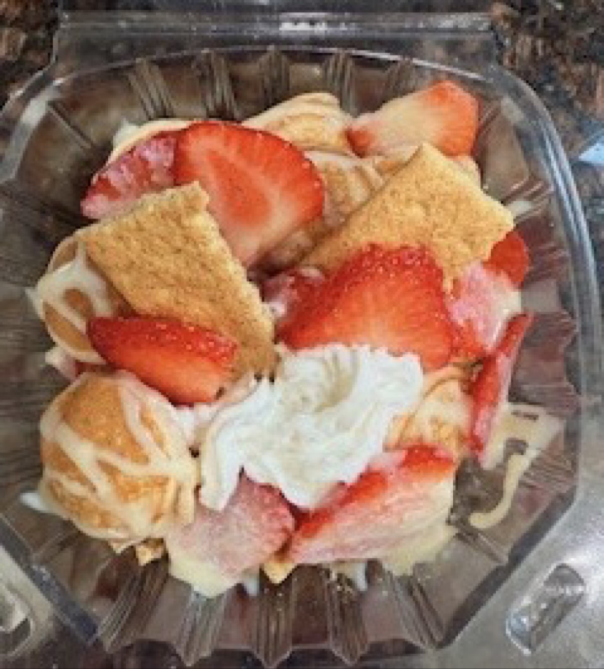 Strawberry shortcake mini pancakes with graham crackers and whipped cream